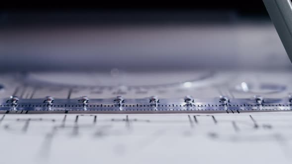 Drawing Line with Pencil and Ruler Plan Blueprint Closeup
