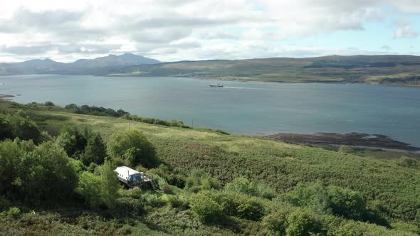 AERIAL - A modern aluminium cabin home on Scotlands West coast