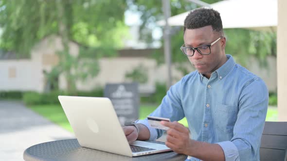 Successful Online Payment on Laptop By African Man