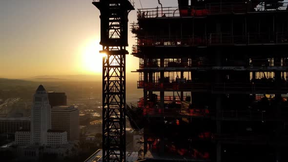 Aerial shot of a new high-rise building under construction alt