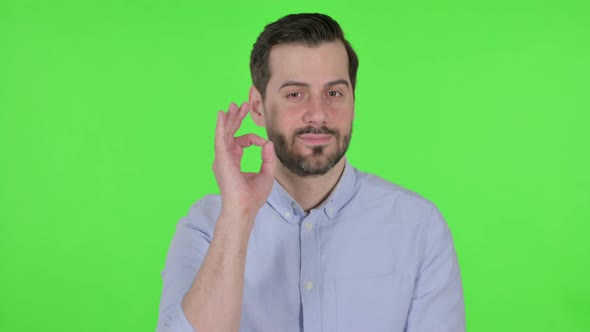 Portrait of Man Showing Ok Sign with Finger Green Screen