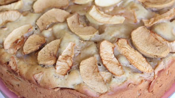 A Baked Apple Pie Is Rotated On A Stage. Cooking Charlotte At Home.