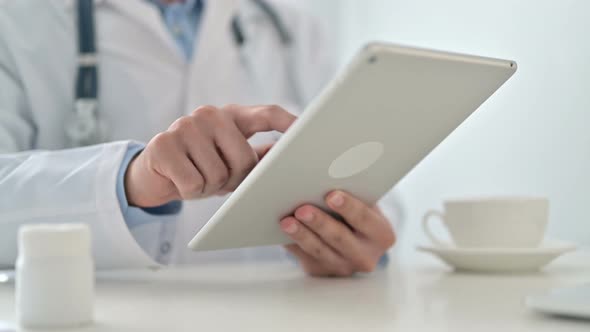 Doctor Using Tablet