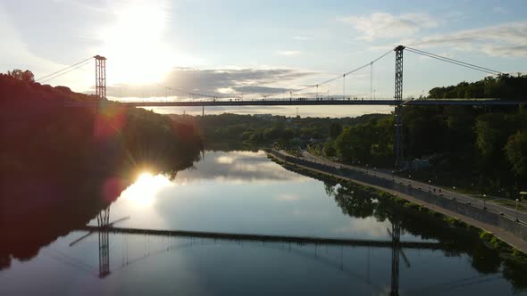 Aerial Shot The City Zhytomyr. Pedestrian Suspended Bridge Through The R. Teteriv. Ukraine