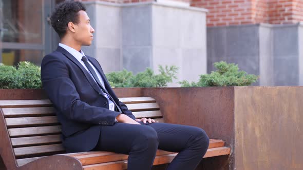 Serious African Businessman Looking at Camera