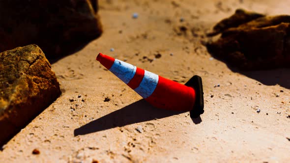 Traffic Safety Cone at Empty Sand Beach