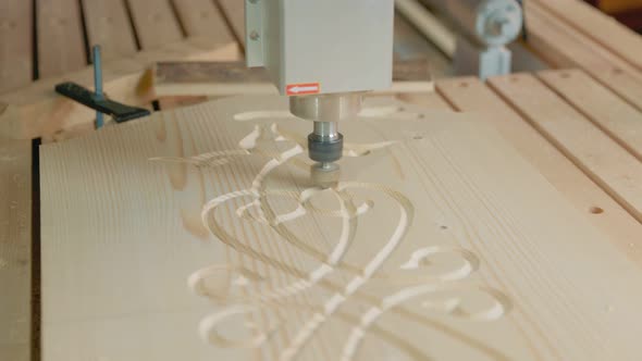 CNC Machine Cuts a Pattern on a Workpiece