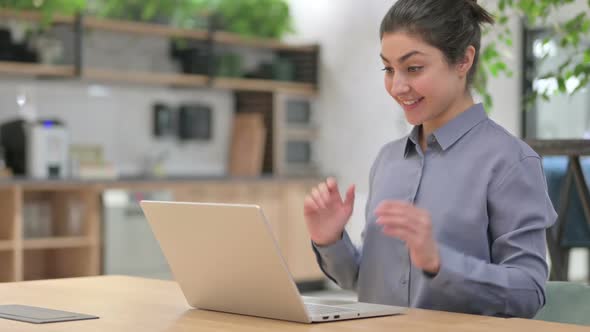 Young Indian Woman Talking on Video Call on Laptop