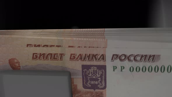 5000 Russian rubles in cash dispenser. Withdrawal of cash from an ATM.