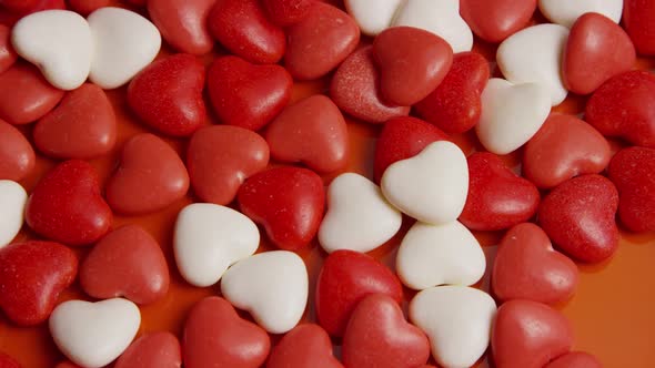Rotating stock footage shot of Valentines decorations and candies - VALENTINES 0048