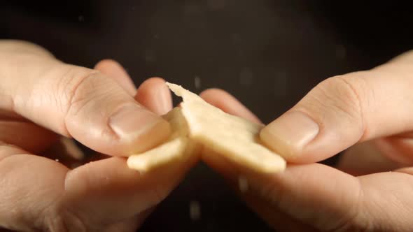 Human Hands Break A Cookie