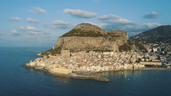 Drone footage of Cefalu during sunset in Island of Sicily Italy 4K