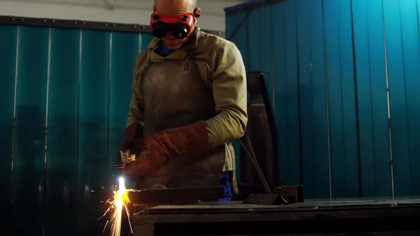 Welder welding a metal