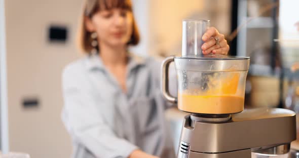 Housewife Prepares Dough for Baking Waffles at Home