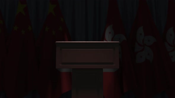 Row of Flags of Hong Kong and China and Speaker Tribune