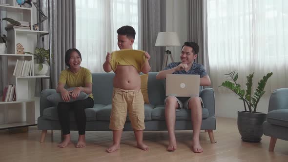 Funny Asian Family In Living Room