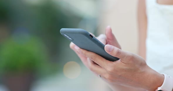 Close up of woman using mobile phone