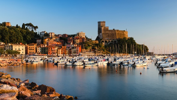 Panoramic Day to Night Sunset Time Lapse of Porto di Lerici and Castello di Lerici with many boats