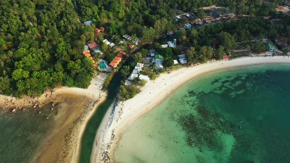 Wide birds eye abstract view of a white sand paradise beach and turquoise sea background in colourfu