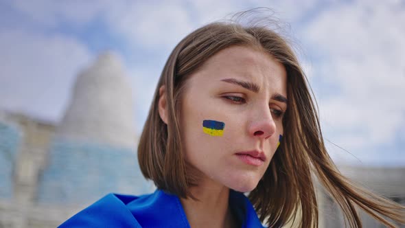 Ukrainian Woman Feels Sorrow for Native Country Crying