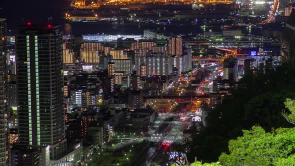 Kobe City Traffic Illuminated at Night Timelapse