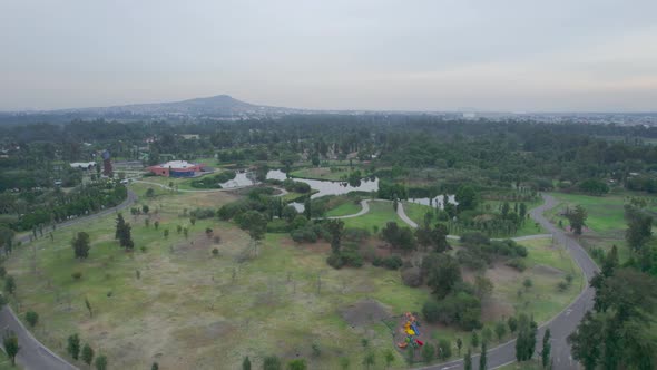 Orbital view above natural running track in middle of natural area in Mexico City