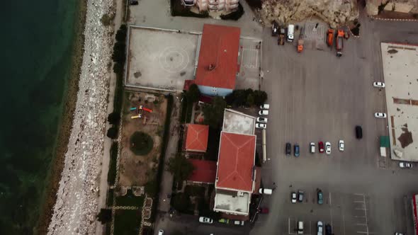 Top View of the Coastline and City Located on the Narrow Peninsula Surrounded By Huge Lake