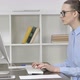 Young Casual Girl Working On Computer in Office - VideoHive Item for Sale