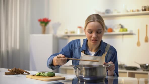 Girl Disgusted With Stinky Meal on Stove