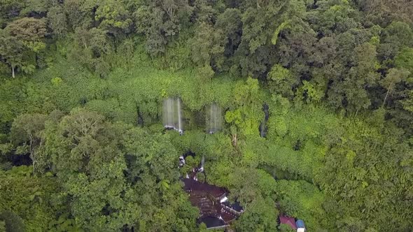 Adventure in the jungleMarvelous aerial view flight pull in from panorama overview drone footageWa