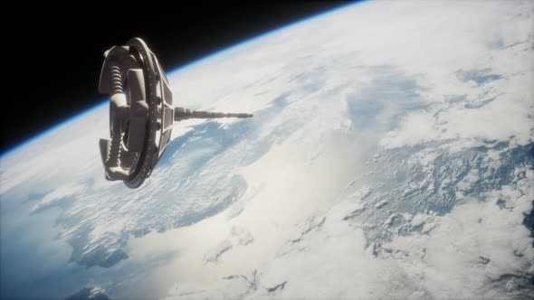 Futuristic Space Satellite Orbiting the Earth