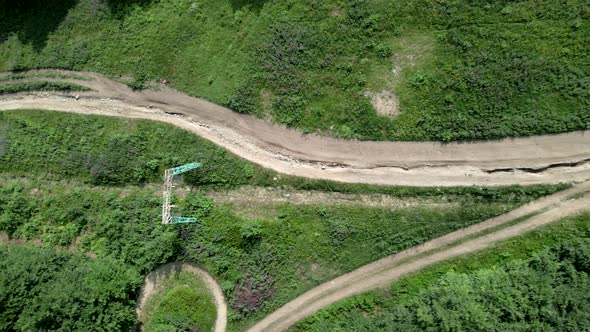 Overhead Top View of Chairlift in Mountains