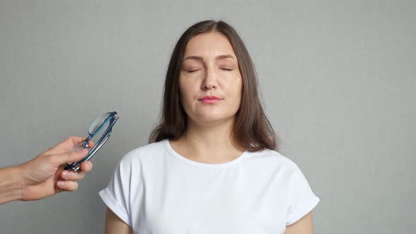 Unhappy Woman Gets Offered Eyeglasses and Refuses in Optics