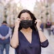 Slow Motion of Pretty Hispanic Middle Aged Woman Take Off Mask - VideoHive Item for Sale