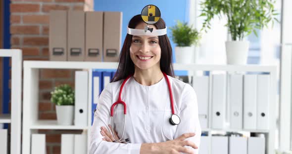 Portrait of Smiling Female Doctor with Frontal Reflector on Her Head  Movie Slow Motion