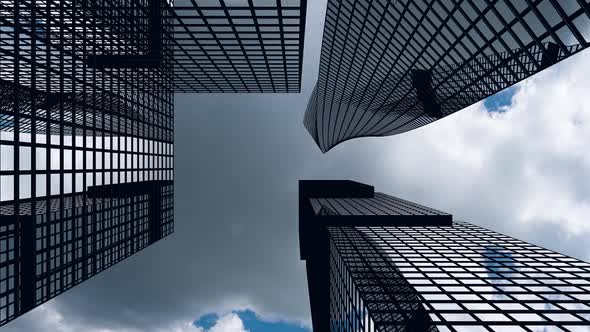 Airplane Flight Over the Business Center of Skyscrapers