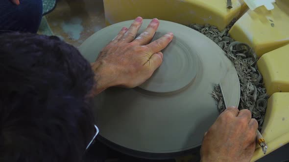 Man Making A Mud Plate