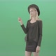Blonde Girl In Cap Choosing Virtual Products On Touch Screen   4 K Green Screen Video Footage 006 - VideoHive Item for Sale