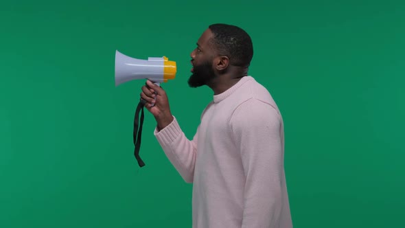 Handsome Black Man Shouting By Megaphone on Green Screen, Chroma Key