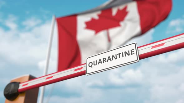 Opening Barrier with QUARANTINE Sign at the Canadian Flag alt