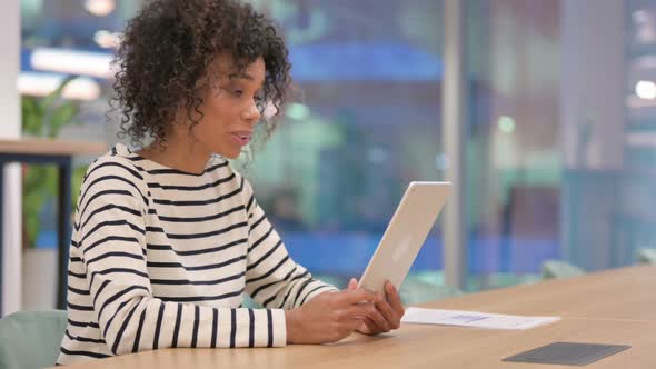 African Woman Doing Video Call on Tablet