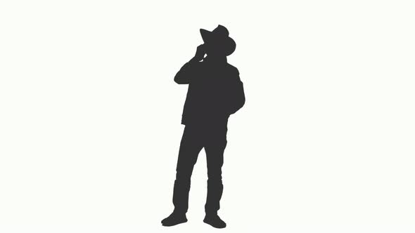 Silhouette of a Man in Cowboy Hat Talking on Smartphone, Alpha Channel
