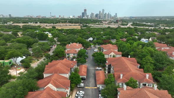 Southwest USA view. Homes in residential distance. Urban American city skyline in distance. Rising a