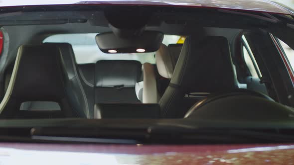 Overweight Housewife Sitting in Car with Groceries Bag Driving Home After Shopping