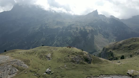 Aerial View Over a Group of Horses Grazing on the Grasslands Along the Lake Ayous in the Pyrenees in