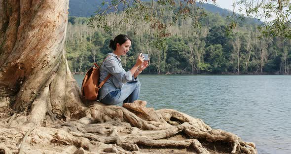 Woman enjoy view of the lake