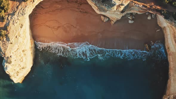 Drone shot of waves hitting the wild coast