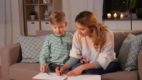 Mother and Son with Pencils Drawing at Home