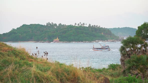 A Boat Trip the Bay Between Two Tropical Islands in The Sea