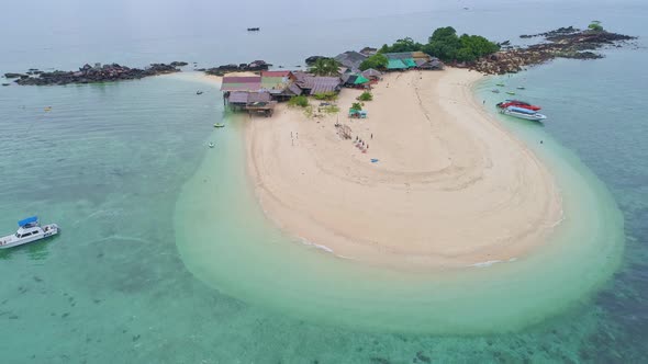 Aerial view drone video of Amazing small island beautiful tropical sandy beach